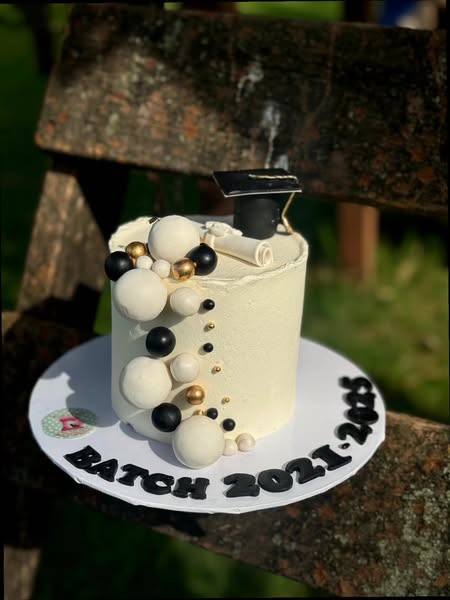 black and white graduation cake